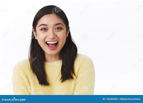 Carefree Happy Young Asian Girl Laughing And Smiling At Camera Having Fun Enjoying Talking To