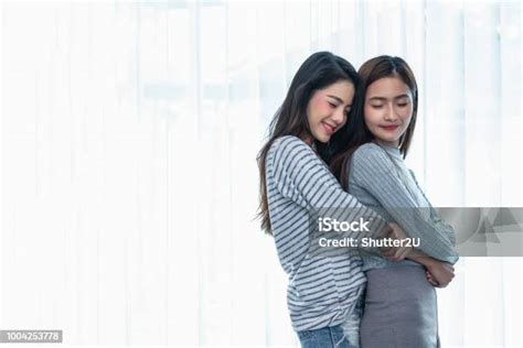 Two Asian Lesbian Women Hug And Embracing Together In Bedroom Couple People And Beauty Concept