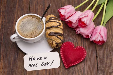 Cup Of Coffee Tulips Have A Nice Day Massage And A Heart Stock Photo