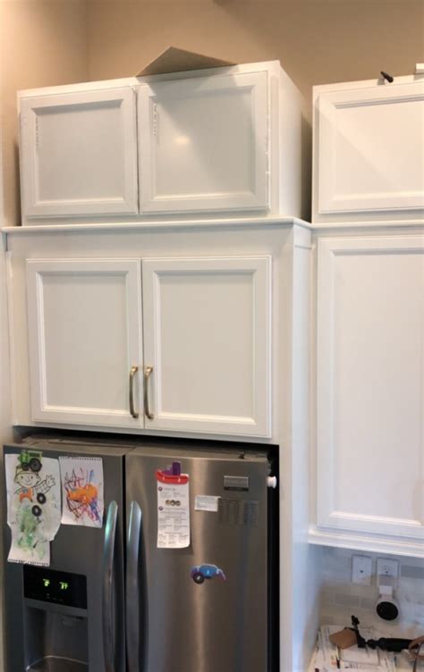 Using a triagular backing piece with ca glue and nails.background music: DIY Stacked Kitchen Cabinets - Frills and Drills