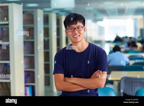 One Young Male Asian Or Chinese College Students Looking At Camera