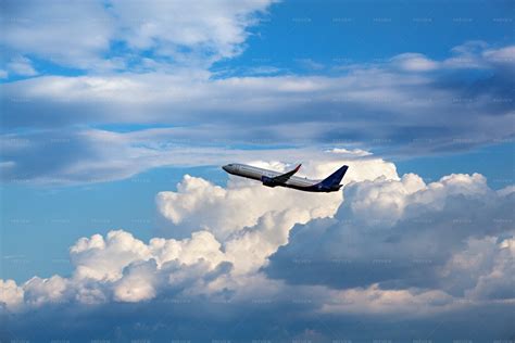 Airplane In The Clouds Stock Photos Motion Array