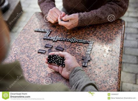 Senior Men Playing Domino Outdoor Stock Image Image Of Comrade