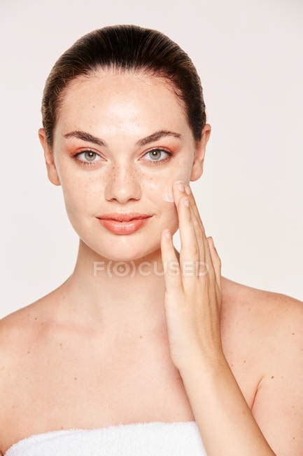 Amiable Woman Taking Care Of Face — Fresh Makeup Stock Photo
