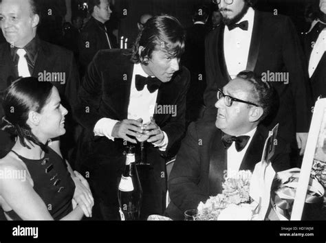 From Left Ali Macgraw Robert Evans Henry Kissinger At The Premiere