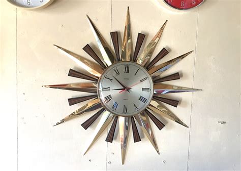 A beautiful sunray designed timepiece bursts onto your homes wall and features black tick marks to represent each hour. Metamec Starburst Clock - Vintage Sunray Clock | Clock ...