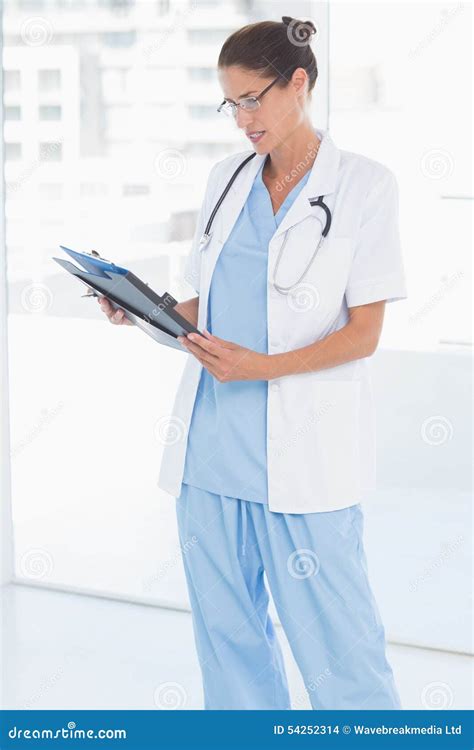 Portrait Of A Confident Female Doctor Stock Photo Image Of Attractive