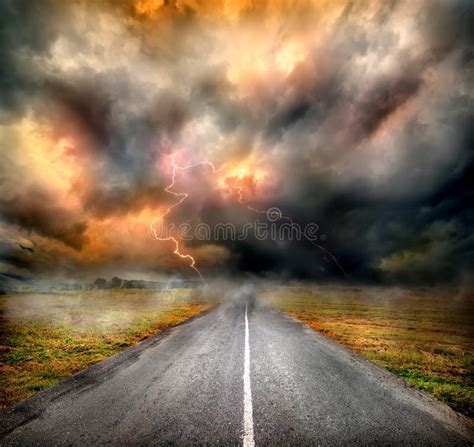 Storm Clouds And Lightning Over Highway Stock Photo Image Of Green