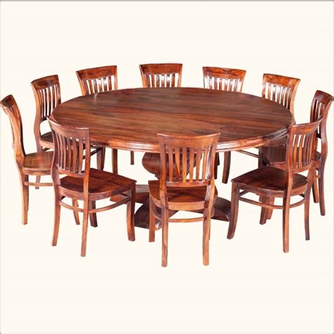 The table is crafted from solid hardwood and veneer finished in black. Perfect 8 Person Round Dining Table - HomesFeed