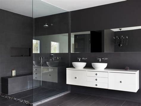 White is an ideal paint color choice for small bathrooms because it reflects light and makes the space appear larger. black-white-bathroom-design-floating-bathroom-vanity ...