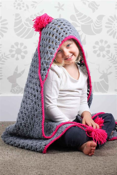 Based On A Large Granny Square The Granny Gives Back Crochet Hooded Baby Blanket Pattern