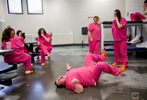 Portrait of despair: Opioids land more women behind bars — AP Images