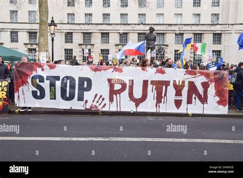 London Uk 13th March 2022 Protesters Hold A Stop Putin Banner Thousands Of Protesters