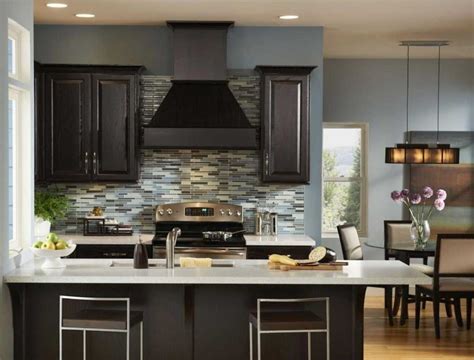 Even the kitchen island s green fits into this family. Popular paint colors for kitchens with blue wall paint ...