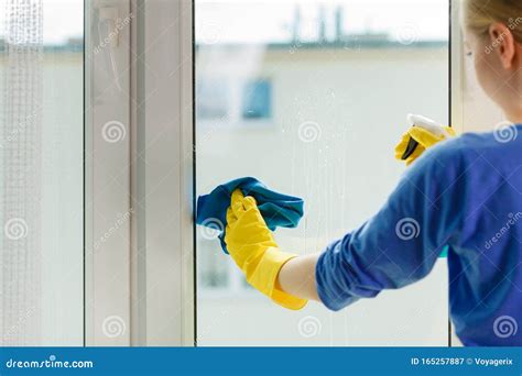 girl cleaning window at home using detergent rag stock image image of hand housekeeping