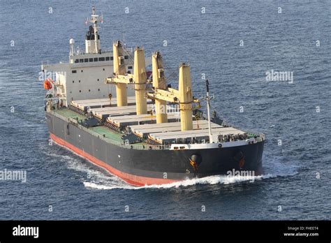 A Cargo Ship Carrying Goods Between Ports Stock Photo Alamy
