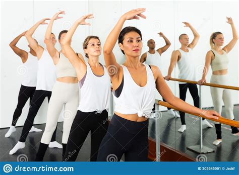 Warm Up Sessions At Bench Women And Men Doing Ballet Stock Image