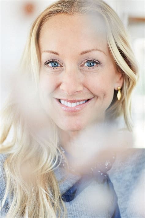 Closeup Portrait Of Mature Woman With Blonde Hair By Stocksy Contributor Trinette Reed Stocksy