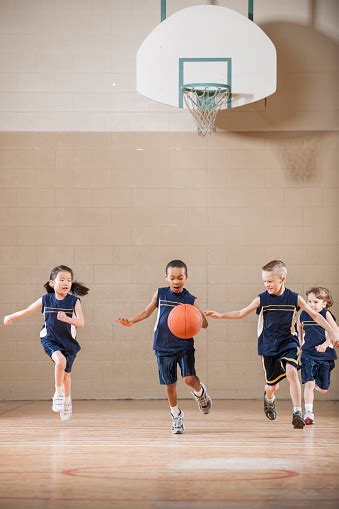 Children Playing A Basketball Game Stock Photo Download Image Now