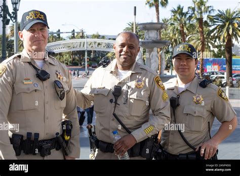 Three Metro Police Officers Pose For A Photo In Las Vegas Nevada Usa