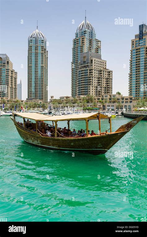 Dubai Marina Tourist Dhow Boat Overlooked By The Skyscrapers Dubai