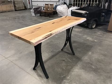 A Custom Highboy Table With A Hickory Live Edge Single Slab