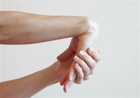 10 Soothing Stretches To Release Wrist Pain Paleohacks Blog