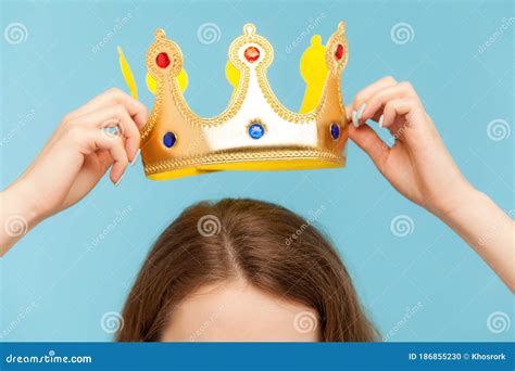 Closeup Of Woman Putting On Head Golden Crown Concept Of Awards