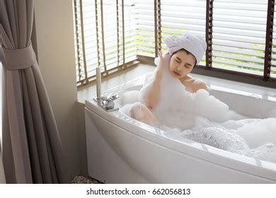 Стоковая фотография Asian Women Shower Bathtub Shutterstock