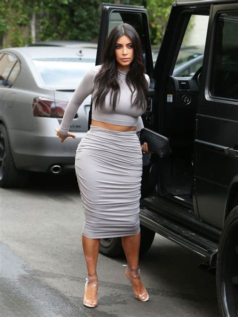 kim kardashian shows off major curves in clinging grey skirt as she steps out in los angeles