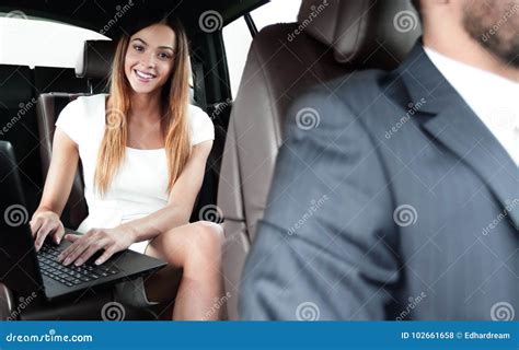 Executive Businesswoman In Car Work On Her Laptop Stock Photo Image