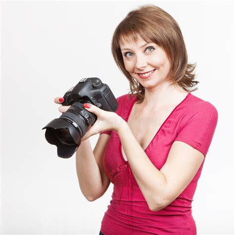 Young Woman Holding Camera And Looking Photos Stock Image Image Of