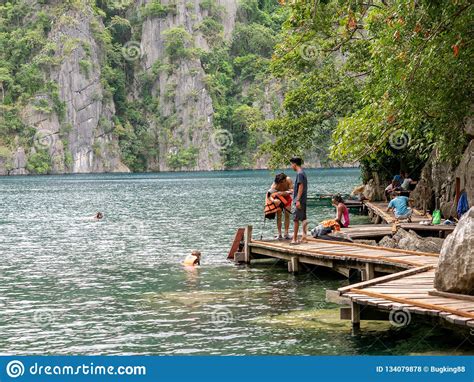 People Who Enjoy Water Play In The Kayangan Lake At Coron Island