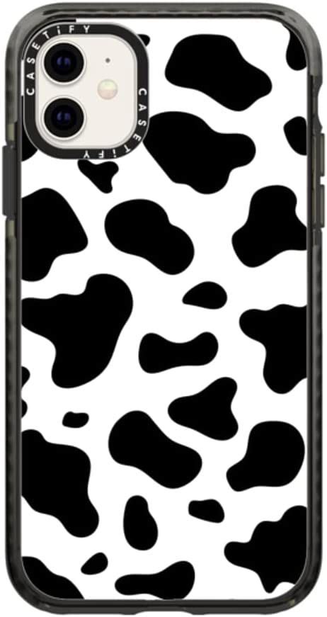 An Iphone Case With Black And White Cow Print