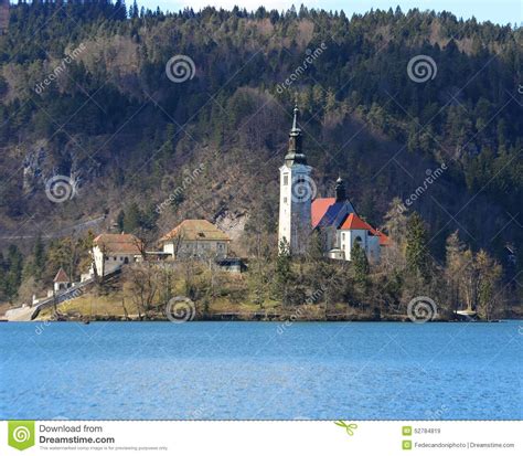 Church With A High Bell Tower On The Island On Lake Bled In Slov Stock