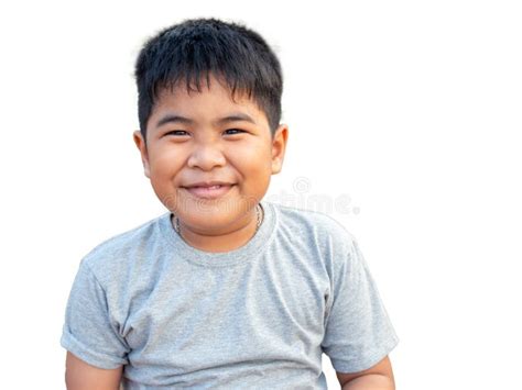 Portrait Of Smiling Boy Isolated On White Background Stock Photo