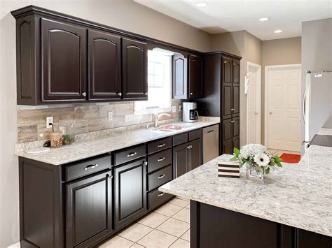 Pack a punch with freshly painted kitchen cabinets. dark brown cabinets, espresso cabinets, espresso painted ...