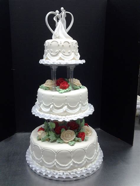 3 tier wedding cake by roly s bakery buttercream wedding cake wedding cakes with cupcakes