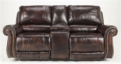 Rolled sock arms and tapered legs give the piece a casual look. The Best Reclining Sofa Reviews: Motorized Recliner Sofa ...