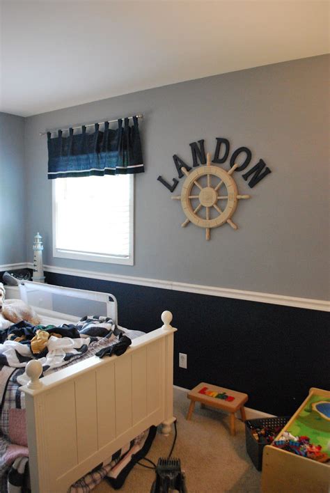 This boys bed features a bunk bed finished in navy blue paint, pairing up with the side table and shelving. Nursery Paint Ideas 82 - mybabydoo | Boys bedroom colors ...