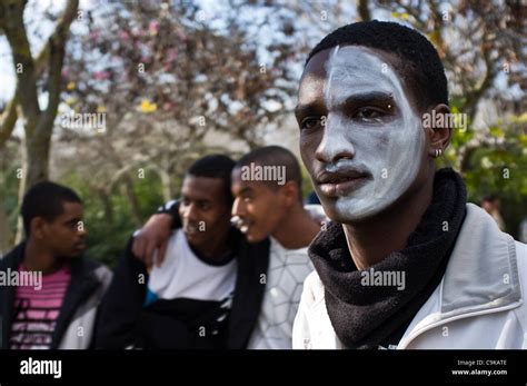 Young Ethiopians Paint Their Faces In Black And White At The Wohl Rose