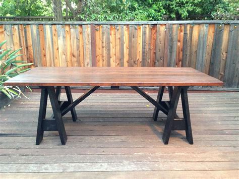 This outdoor table was inspired by several other designs online. Sawhorse Outdoor Table by my Lyon men | Do It Yourself Home Projects from Ana White | Outdoor ...