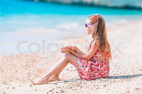 Adorable Little Girl Have Fun At Tropical Beach During Vacation Stock