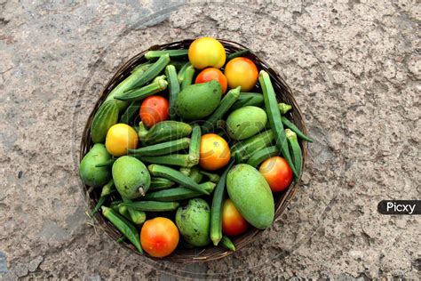 image of some fresh healthy vegetable put in a basket on stone background dc969938 picxy