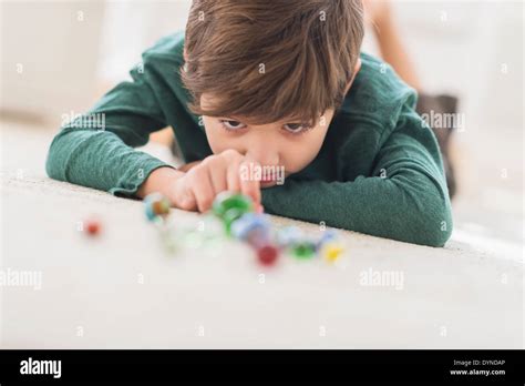 Boy Playing Marbles Hi Res Stock Photography And Images Alamy