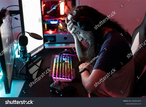 Stressed Gamer Sitting Head Hand Home Stock Photo 2182915679 Shutterstock