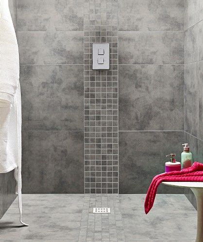 These designer bathrooms use tile on floors, walls, and backsplashes to stylish effect. Zamora Grey Wall and Floor Tile 29.5x59.5cm | Topps Tiles ...