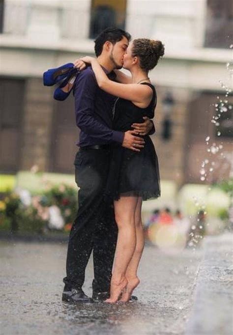 Twirling During The 2014 Storm Kissing In The Rain Kiss And Romance Couples In Love