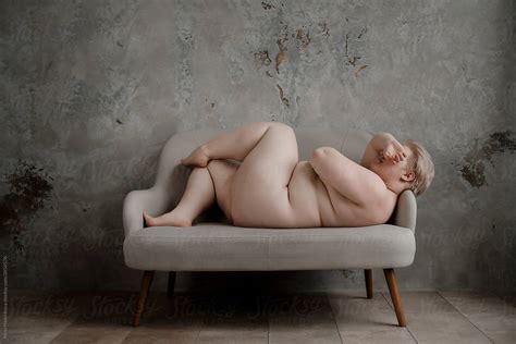 Naked Woman Lying Hiding Face By Stocksy Contributor Alina Hvostikova Stocksy