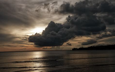 Ocean Sea Sunset Sunrise Storm Clouds Wallpaper 1920x1200